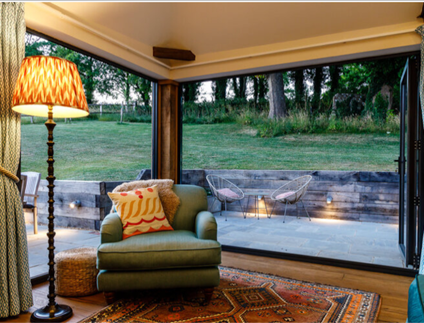 Connecting the inside to the outside spaces for barn conversion holiday cottage - by Astman Taylor