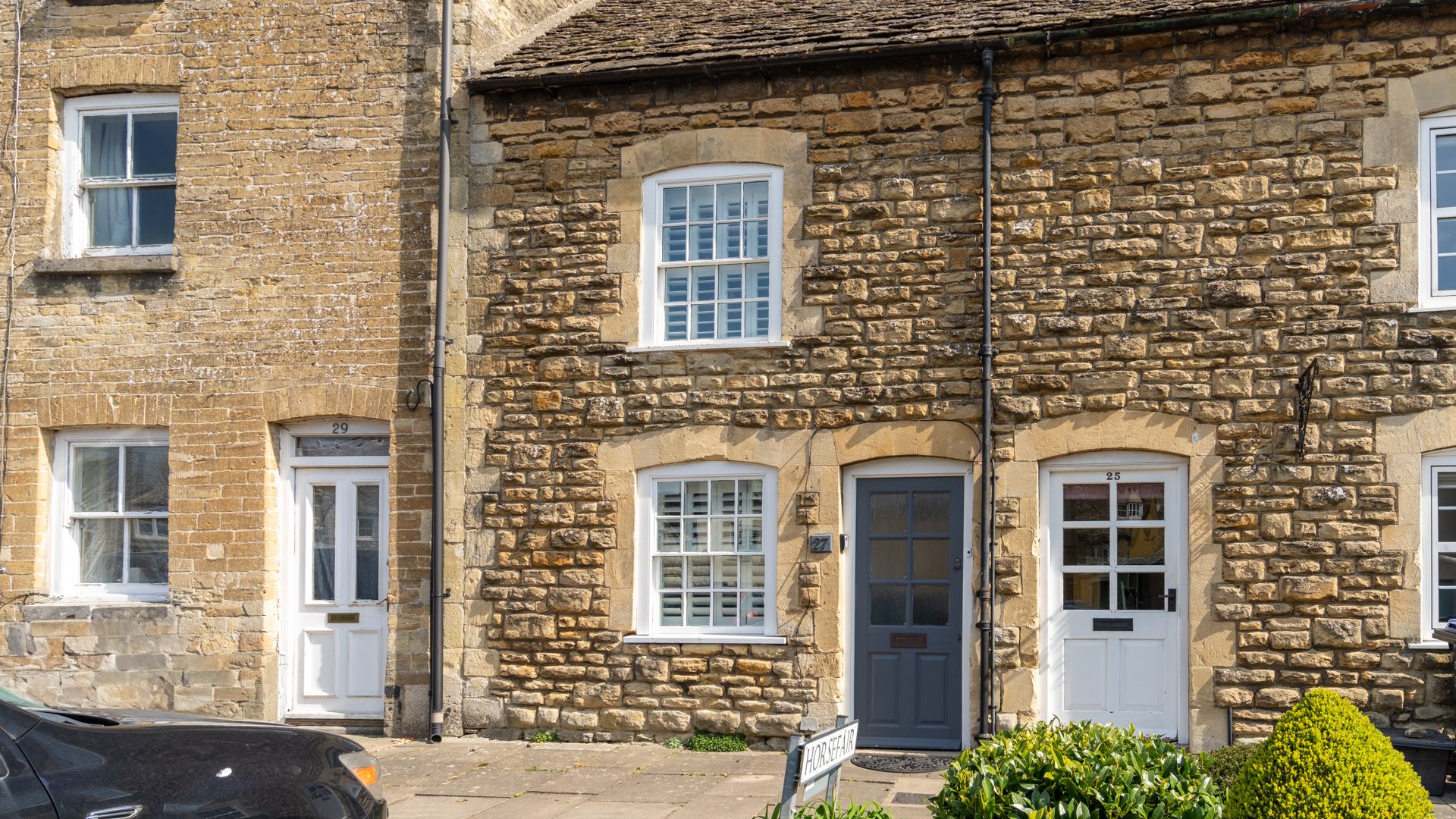 The frontage of Horsefair Cottage is inviting