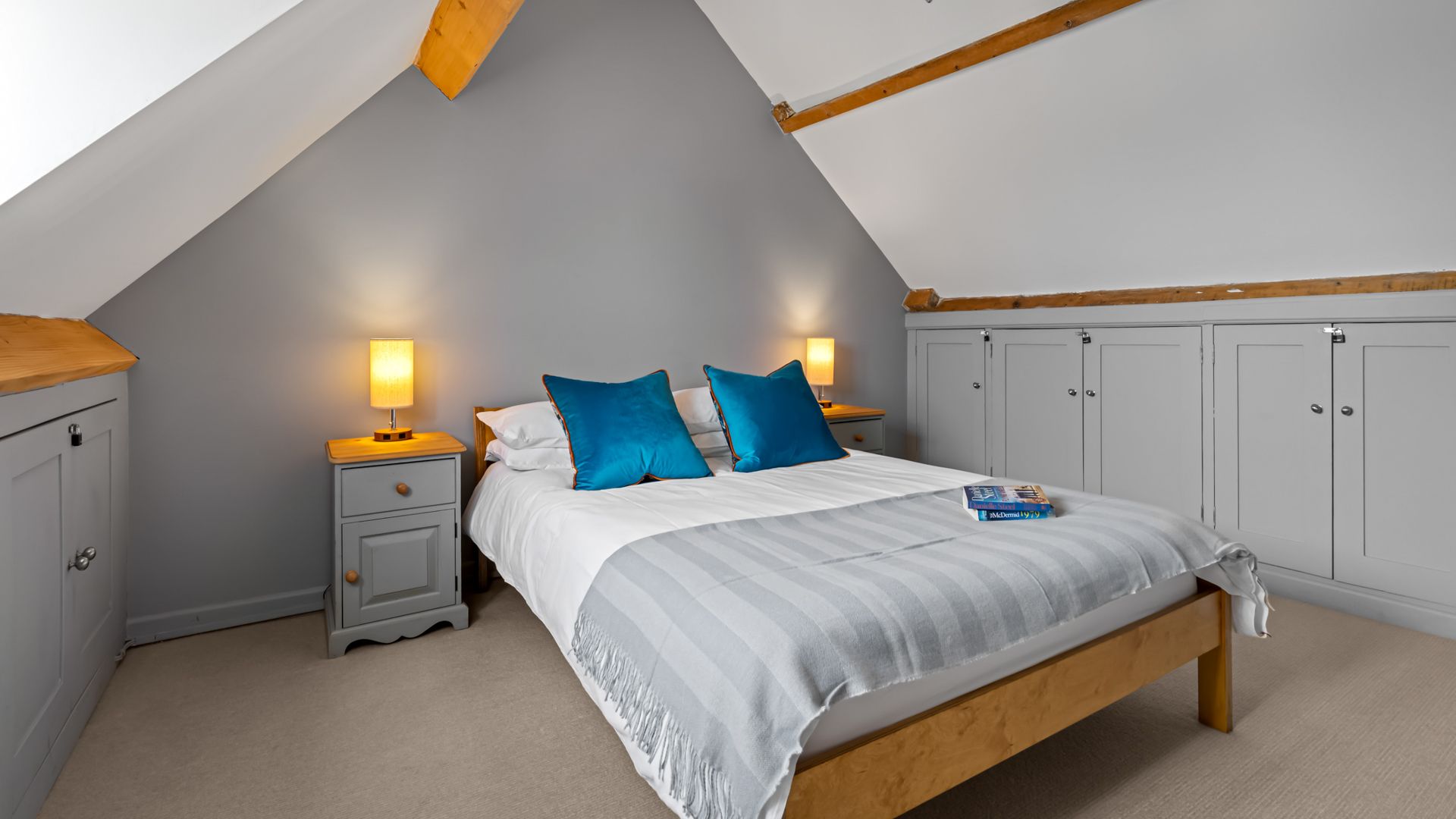 Bedroom two has quintessential exposed beams