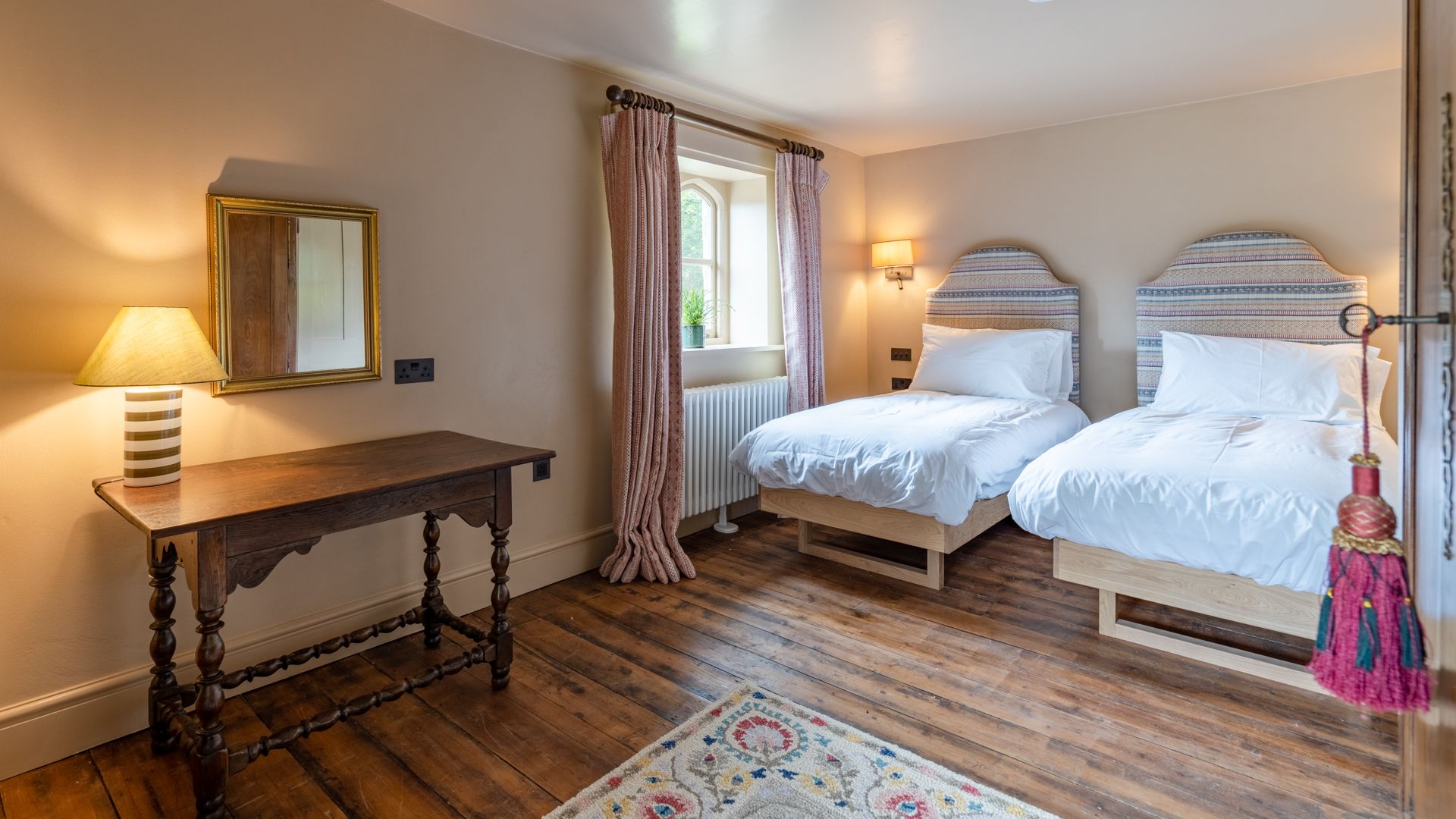 Bedroom three signs off Upper Lodge's first floor with elegance